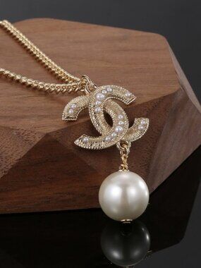 Chanel pearl necklace and earrings